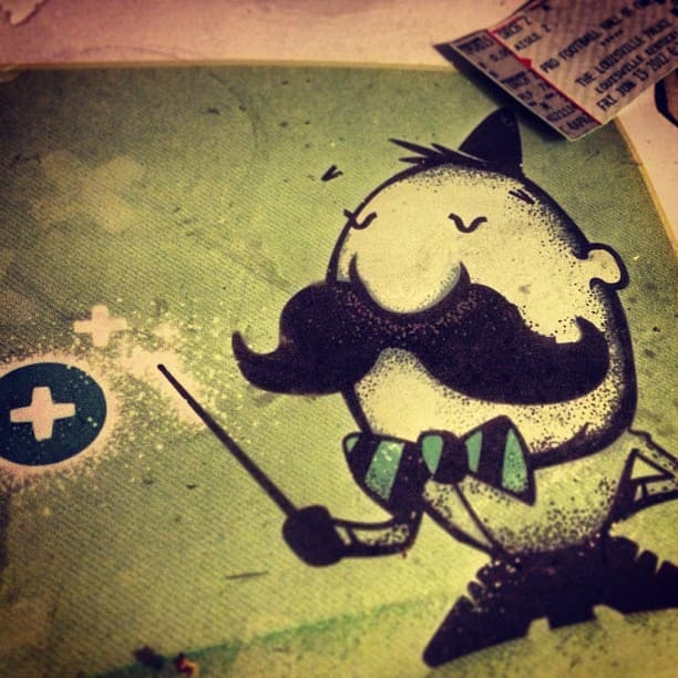 Digital print of a magic gnome illustration who is wearing a bowtie and waving around magic with his wand