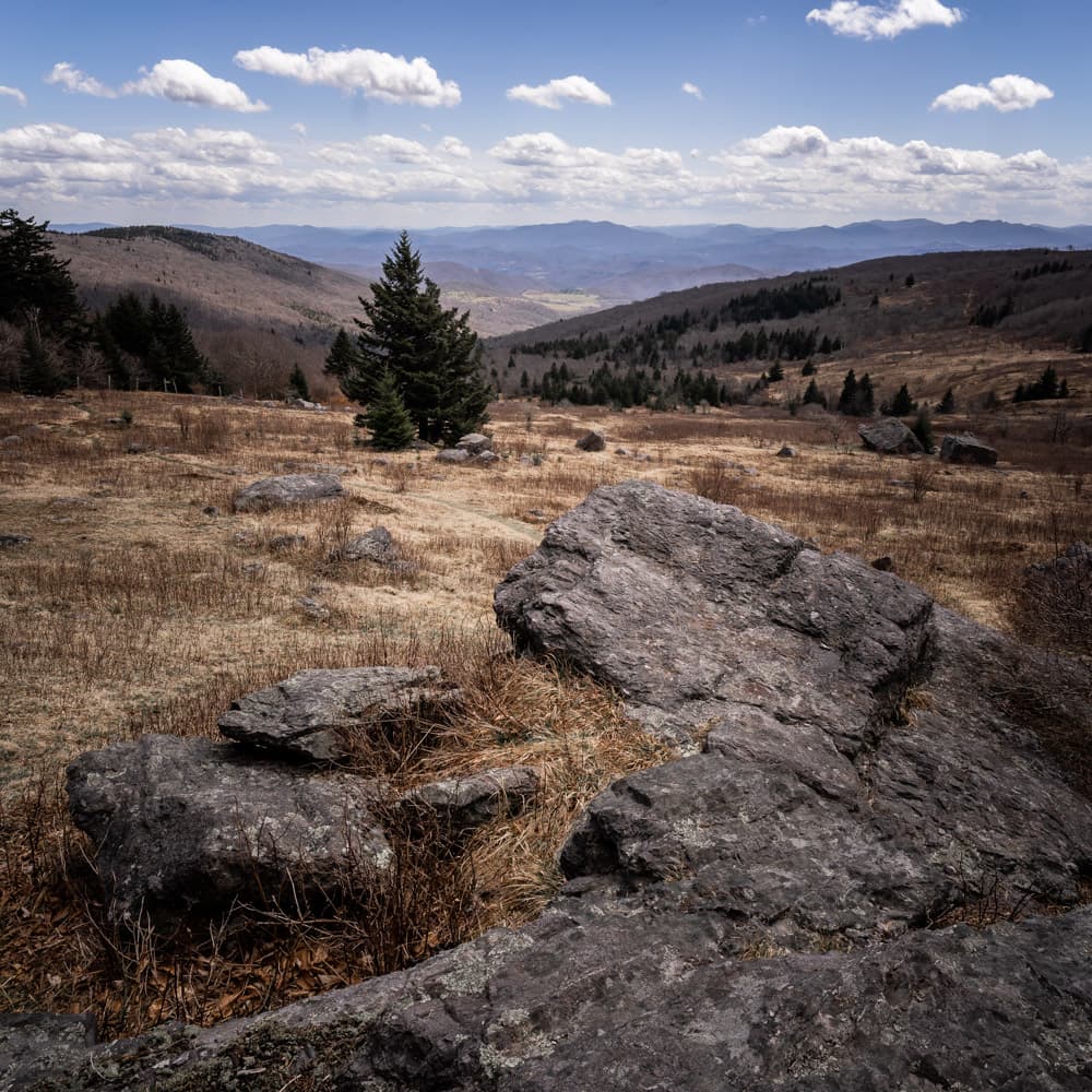 Grayson Highlands expansive vista with fluffy clouds in the distant sky