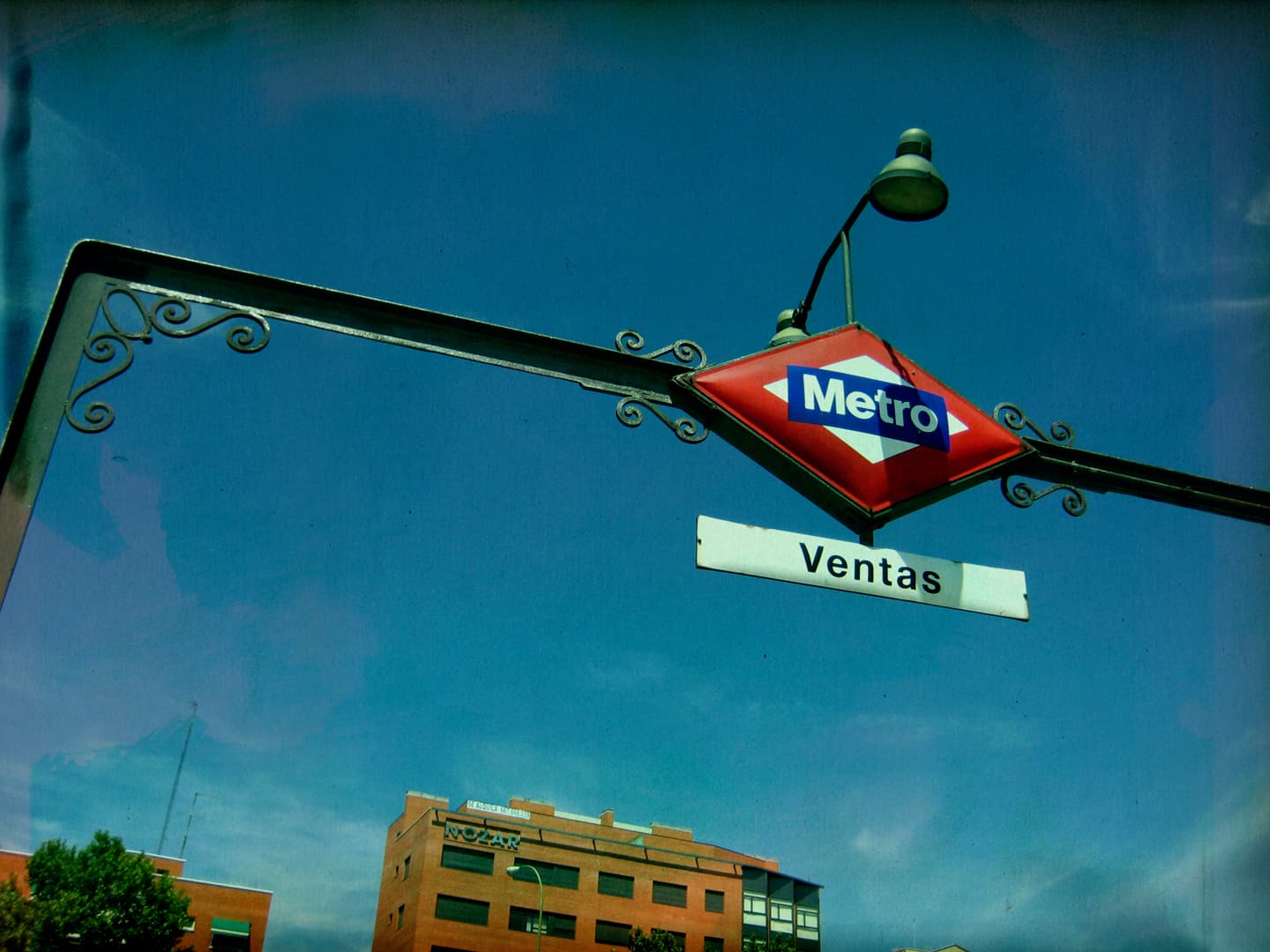 Ventas metro terminal entrance sign with a blue sky behind